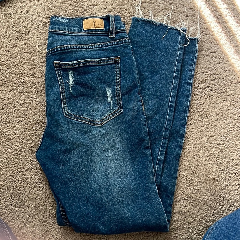 High rise frayed hem jeans
